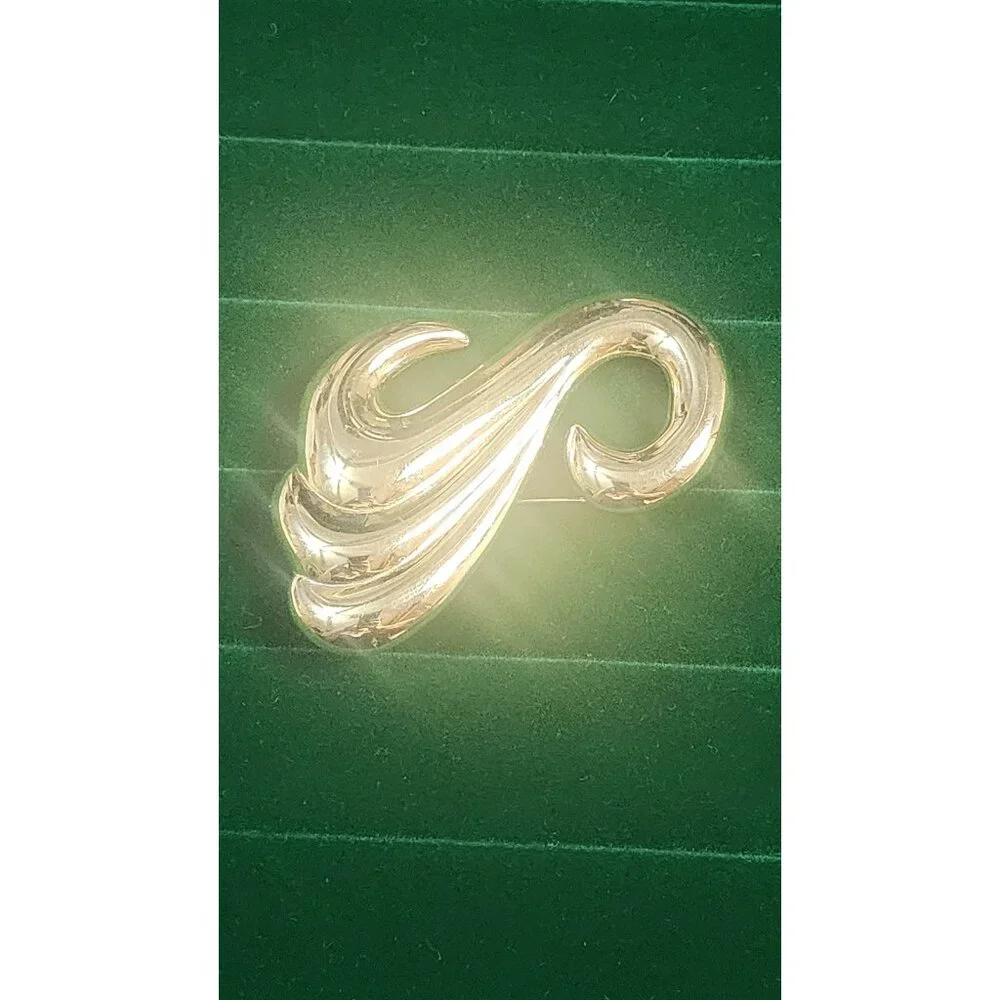 Vintage 80s gold tone sculptural swirl brooch large abstract high polish